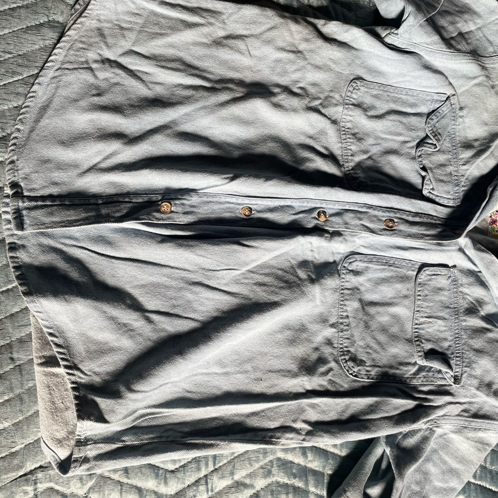 Women’s button up shirt.